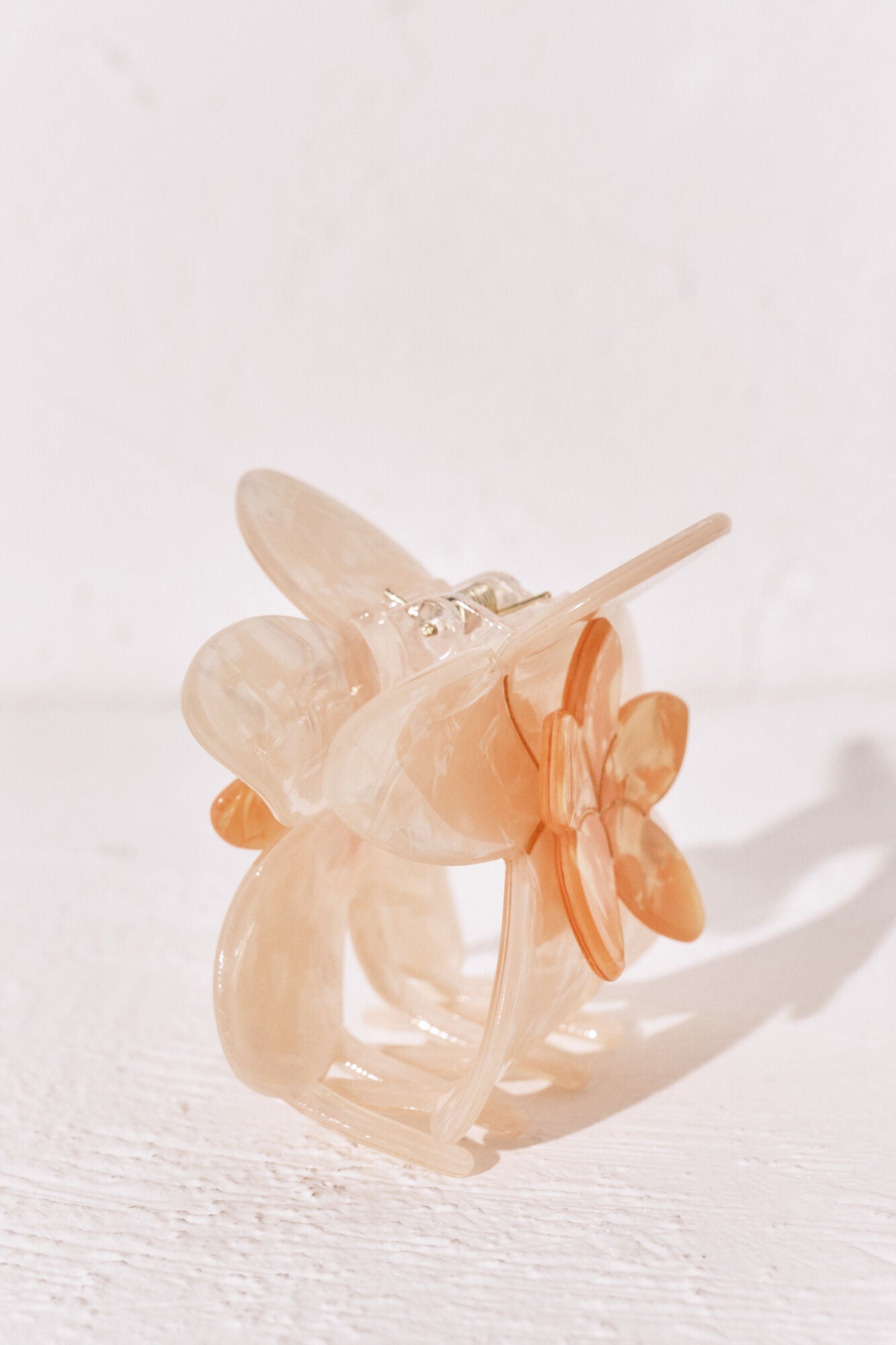 Orange flower hair clip