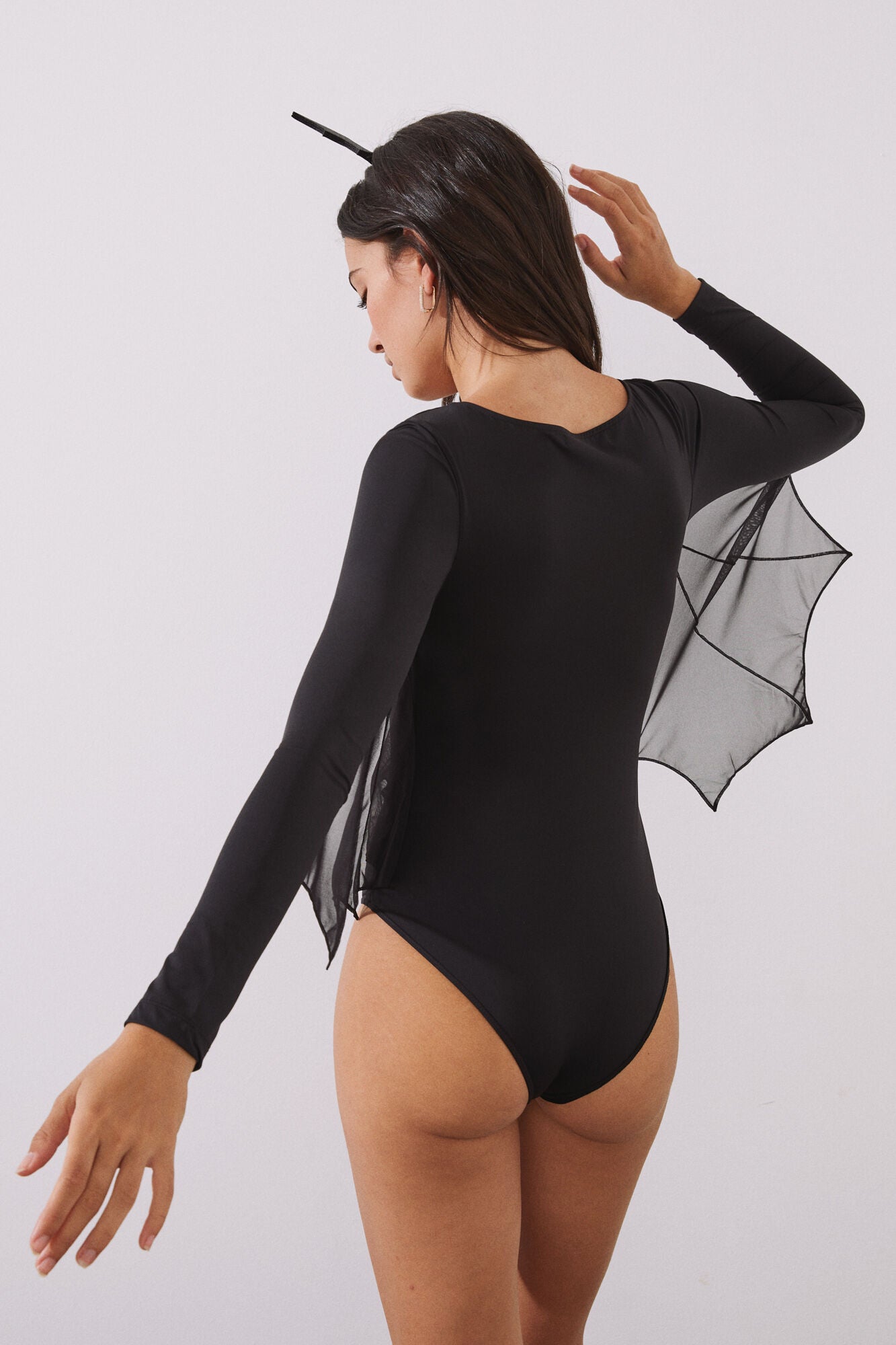 Black long-sleeved bodysuit with bat wings